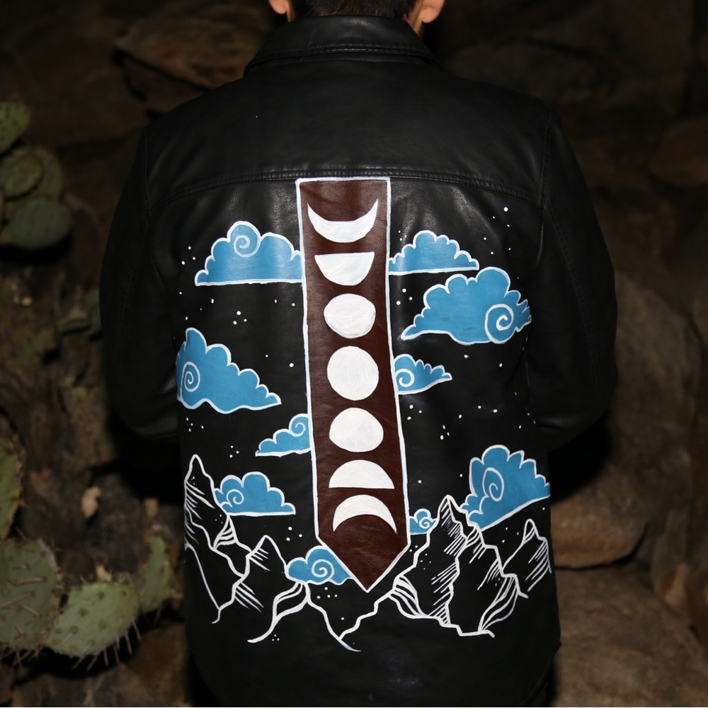 Hand painted design “Mountains” on a leather jacket